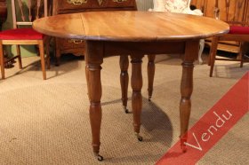 Table ronde à allonges