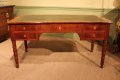 Bureau plat en acajou Restauration