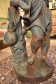 Statue en fonte d'une jeune fille