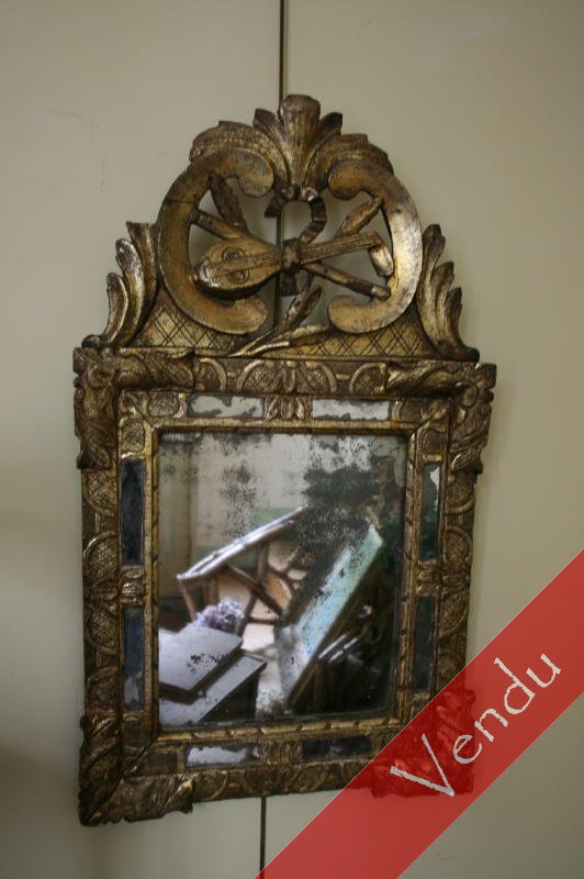 Miroir en bois doré
